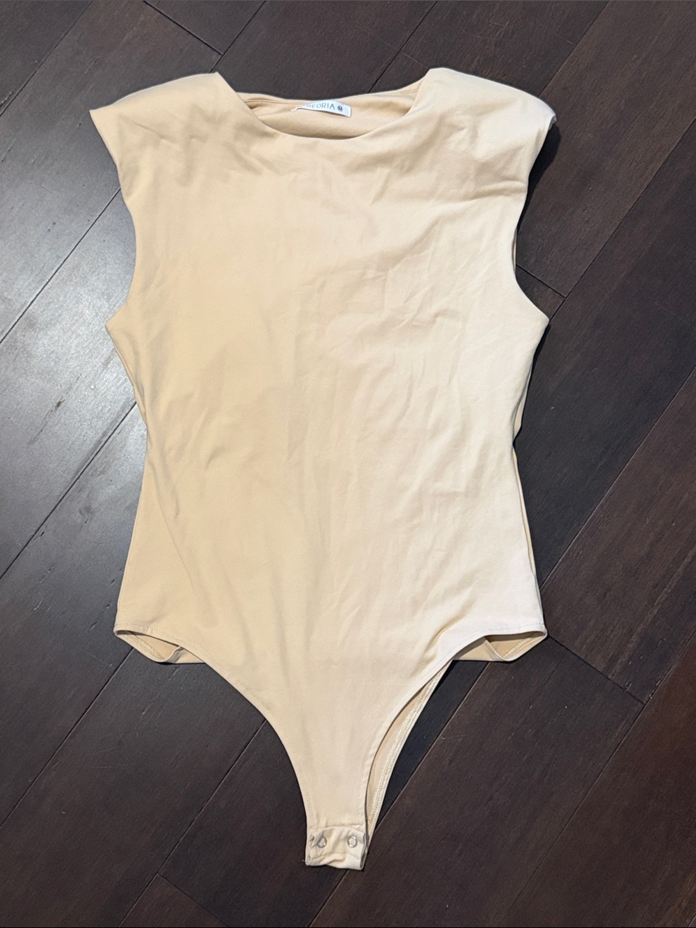 Reoria Sleeveless One-Piece Bodysuit in Beige